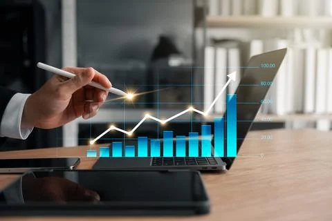 Businessman analyzing business performance data, financial data analysis, g.. Stock Photos