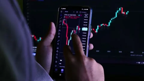 Businessman Analyzing a Candlestick Chart Of a Digital Market Video stock 170153872