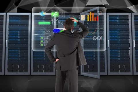 Businessman is analyzing data against database background Stock Photos