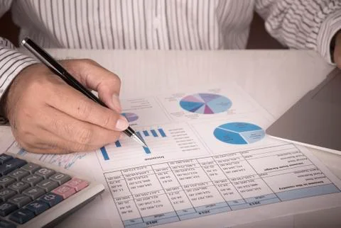 Businessman analyzing data report Stock Photos