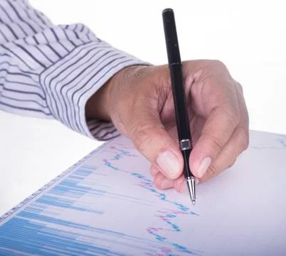 Businessman analyzing data report Stock Photos