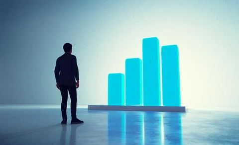 Businessman analyzing glowing data graph for growth Illustrazione stock