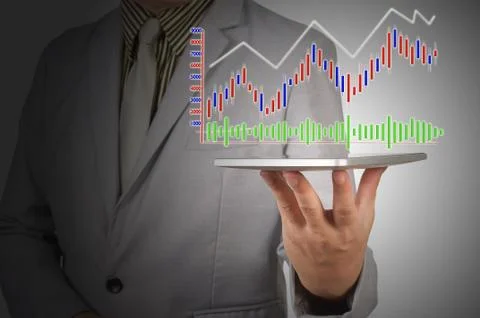 Businessman Analyzing Graph On Digital Tablet Stock Photos