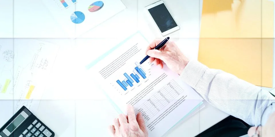 Businessman analyzing graphics, geometric pattern Stock Photos