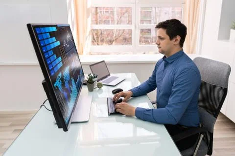 Businessman Analyzing Graphs On Computer Stock Photos