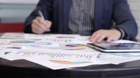 Businessman Analyzing Graphs Stock-Footage 68417895