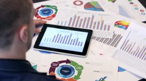 Businessman Analyzing Graphs Stock-Footage 68417900
