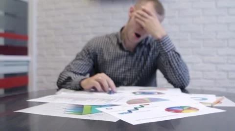 Businessman Analyzing Graphs Stock-Footage 68417938