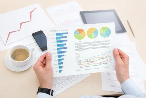 Businessman analyzing information on the chart Stock Photos
