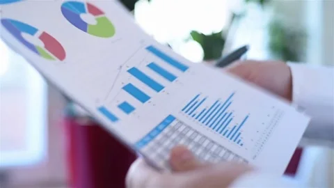 Businessman Analyzing Report Stock Footage 73050768