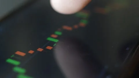 Businessman analyzing trading chart on iphone display. trade market app. Stock Footage 263137521