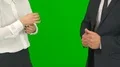 The businessman and businesswoman gesture on the green background 4k or 4k+ Resolution