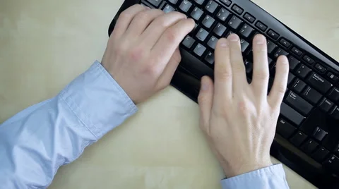 Businessman and computer typing, dolly shot Stock Footage 61724364