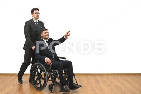 The businessman and a disabled gesturing on the white wall background Stock Photos