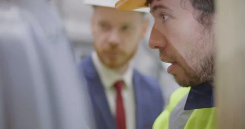 Businessman and engineer working Video stock 109331855