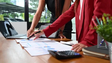Businessman and team analyzing financial statement Finance task. with smart.. Video stock 314351237