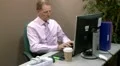 Businessman answering a call HD Footage