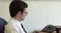 Businessman answers work call HD Footage