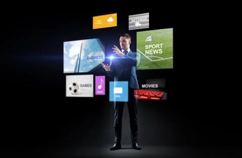 Businessman with applications on virtual screen Stock Photos