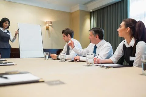Businessman asking question at presentation Stock Photos