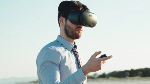 Businessman with augmented reality viewer Stock Footage 196723730