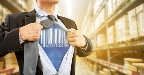 Businessman with barcode reader in warehouse, logistics Stock Photos