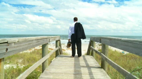 Businessman on the Beach Video stock 553314