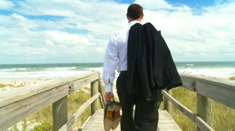 Businessman on the Beach Stock Footage 553532
