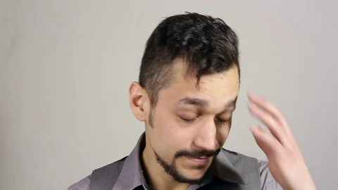 Businessman with a beard Thinking after Big Business Loss Stock-Footage 73685458