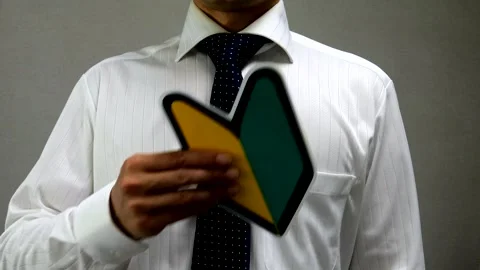 A businessman with a beginner driver sticker in his pocket Stock-Footage 335769992