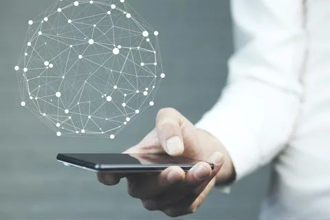 Businessman on blurred background using circle igital data network with mobil Stock Photos