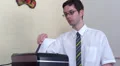 Businessman bored as he shreds HD Footage