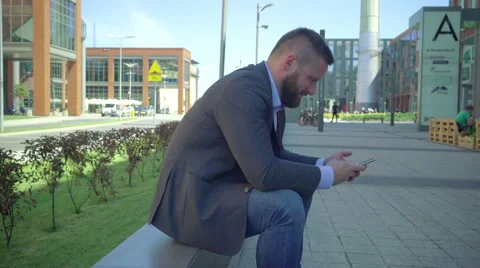 Businessman browsing smartphone. Stock Footage 66297177