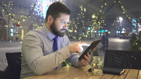 Businessman browsing tablet, look at camera, evening, cafe, portrait 库存影片 72998983