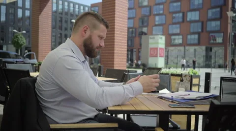 Businessman browsing tablet smiles for camera, steadicam. Video stock 66332882