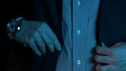 Businessman buttoning his blazer Stock Footage 99503156