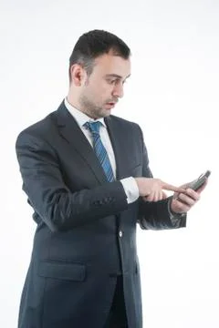 Businessman calculating Stockfoto's