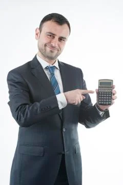 Businessman calculating Stock Photos