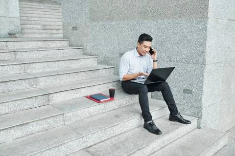 Businessman calling to front end developer Stock Photos