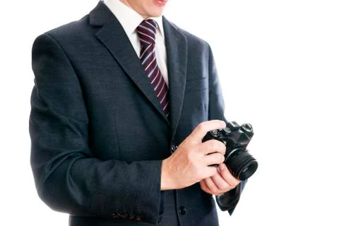 Businessman with camera Stock Photos