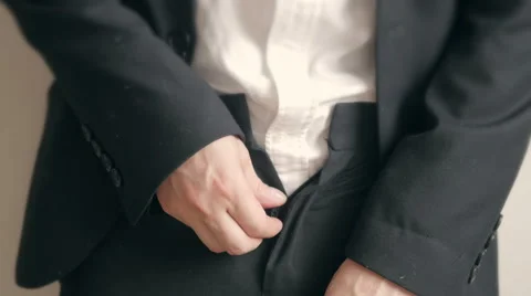 Businessman can t cope with the button trousers. Overweight businessman Stock Footage 64698379