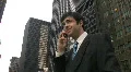 Businessman on cellphone. HD Footage
