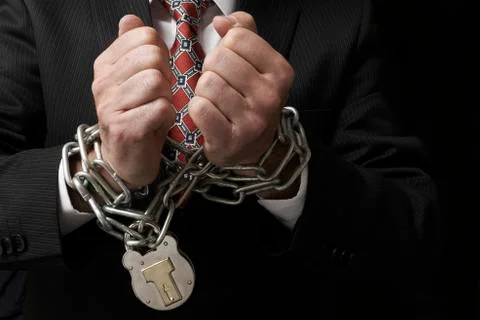 Businessman in chains Stock Photos