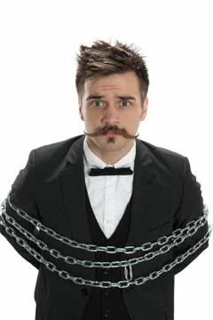 Businessman in chains Stock-Fotos