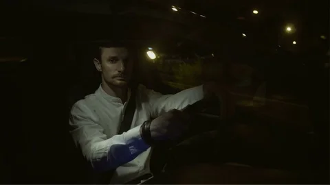 Businessman Changing Gears Twice While Driving Straight Stock Footage 78570406