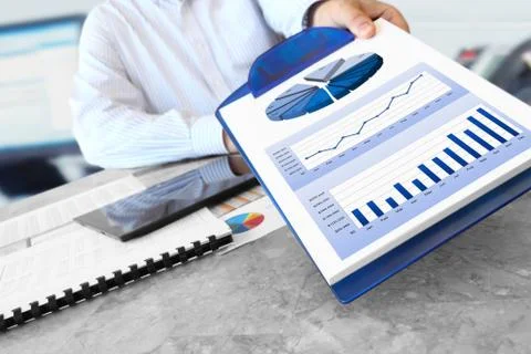 Businessman with Charts Stock Photos