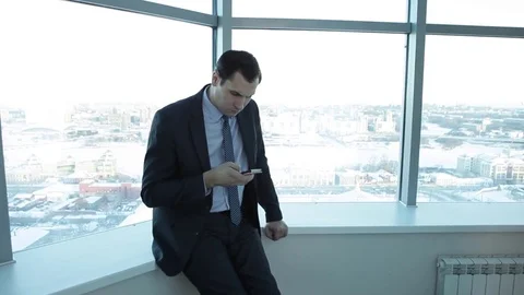 Businessman Chatting During a Break Stock Footage 72558186