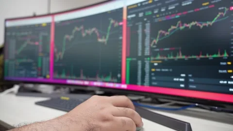 Businessman is checking Bitcoin price chart on digital exchange on computer Video stock 158949025