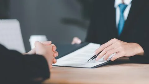 Businessman checking contract documents ,handle business documents and agre.. Stock Photos
