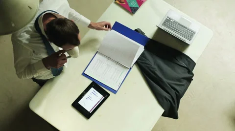 Businessman checking data in documents and tablet, top view Stock Footage 37120295